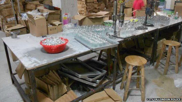 _83052296_insideacounterfeitperfumefactory1